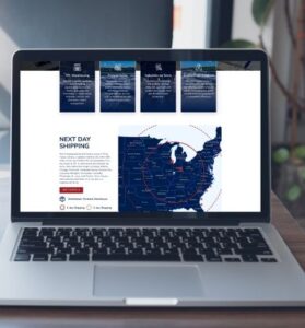 Laptop displaying a redesigned logistics website with an interactive shipping map, optimized for SEO and lead generation.